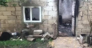 Evde çıkan yangında bir kişi öldü, bir kişi yaralandı